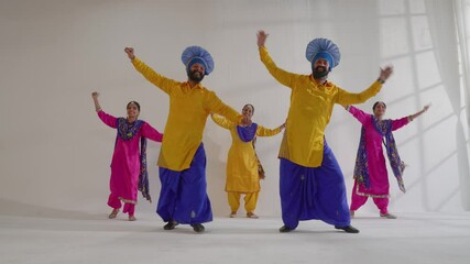 Sikh People performing bhangra during Baisakhi celebration