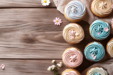 Beautiful and colorful cupcake on wooden table with copy space.