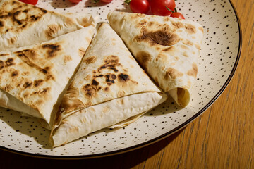 Indulge in Deliciously Grilled Flatbread generously topped with fresh Cherry Tomatoes