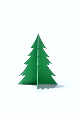 Closeup view of a Christmas tree miniature on a white background