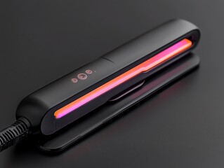 A professionalgrade flat iron, heating up with a glowing plate