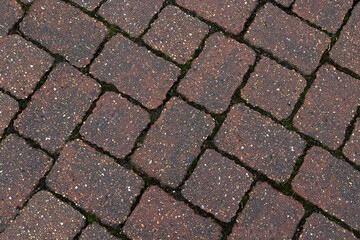 Red block paving stones in closeup background
