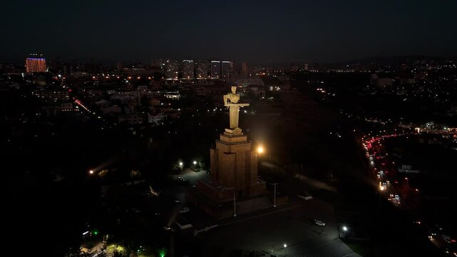 Monument to Mother Armenia (Mair Hayastan).   Drone view Statue mother Armenia(Mayr Hayastan) in night time. Mother Armenia statue in Victory Park in evening time. Female personification of Armenia.