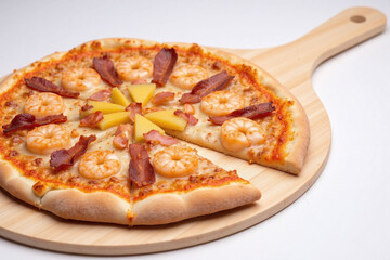 Partially eaten pizza crust toppings cheese surface finish