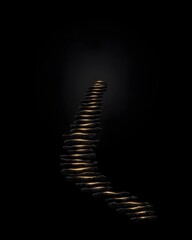 Illuminated stone staircase leading into darkness