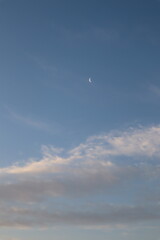 Blue sky, moon and clouds
