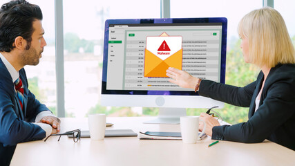 Cyber attacking concept. Malware alert showing on computer screen display scam and threat detection on computer system or online server to be removed snugly.
