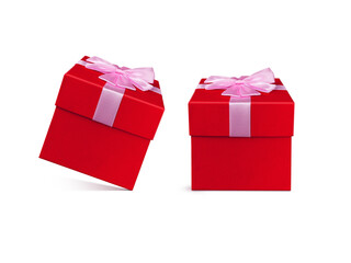 Red gift box tied with a pink bow PNG transparent.