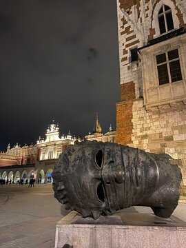 Eros Bendato Sculpture, large head sculpture. Krakow, Poland, February 2022. 