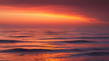 Obraz premium a sunset over a body of water