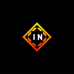 IN initials dynamic geometric logo design features a bold lettering sign in an orange and black color scheme, displayed against a dark background
