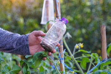 Plastic bottles contain wood vinegar ingredients obtained from burning charcoal. Hang it on...