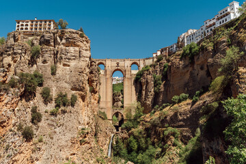 Puente Nuevo bridge what means New Bridge - unique architecture construction over the El Tajo Canyon with Guadalevin river waterfall in Ronda town, province of Malaga, Andalusia, Spain.