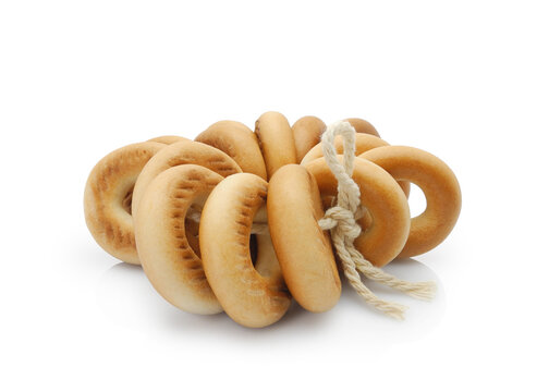 Bunch of small delicious dry bagels (sushki or baranki) isolated on white background