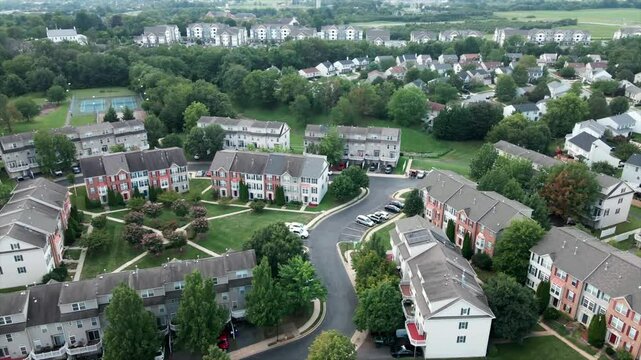 Aerial footage of Frederick, Maryland, USA, showcasing the town's charming streets, historic buildings, landmarks, roads, neighborhoods, parks, and vibrant cityscapes. A captivating picturesque view