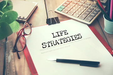 life strategies text on notepad