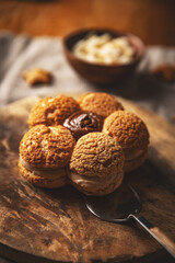 Delicious cream puffs forming flower shape