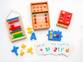 Obraz premium Educational toys for children on a white background. Flat lay.