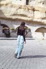 Traveler woman walking on the street  in Cappadocia ,Turkey 