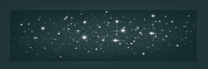 Fototapeta premium Bright glowing sparkles on a transparent background, resembling a starry or glittering effect.