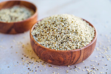 Hemp seeds in a wooden bowl 
