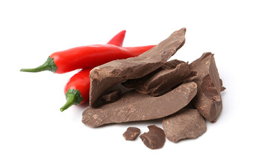 Pieces of tasty chocolate with chili peppers isolated on white