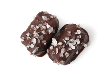Tasty chocolate candies with salt isolated on white, top view