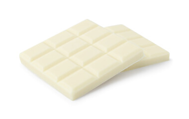 Pieces of delicious white chocolate isolated on white