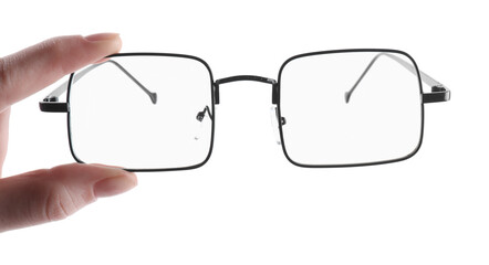 Woman holding glasses with black metal frame on white background, closeup