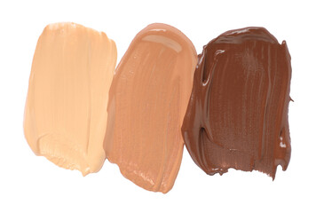 Samples of different foundation isolated on white, top view