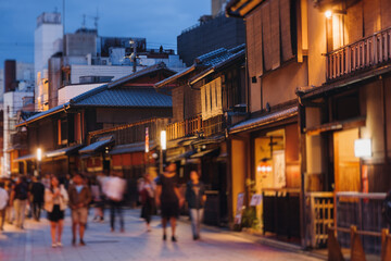 View of Gion district street, Kyoto, Higashiyama-ku, Japan, night illumination of Ninnenzaka and Sannenzaka streets, with old wooden tea houses Hokanji temple and Yasaka Pagoda, Gion geisha quarter