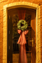 Riga, Latvia A Christmas wreath oin a door in the Old Town.