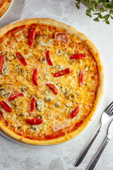 traditional Italian pizza on a white plate