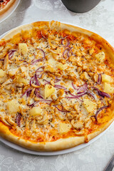 traditional Italian pizza on a white plate
