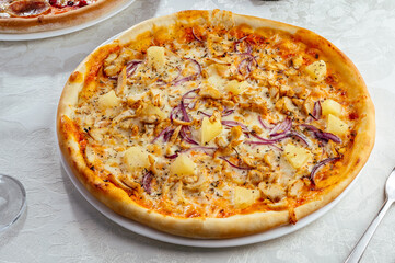 traditional Italian pizza on a white plate
