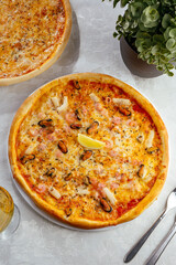 traditional Italian pizza on a white plate