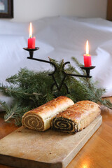 Homemade walnut and poppy seed rolls aka beigli in Hungary. Traditional hungarian christmas or easter cake bejgli at christmastime
