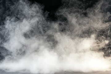 Abstract white smoke clouds on black background.