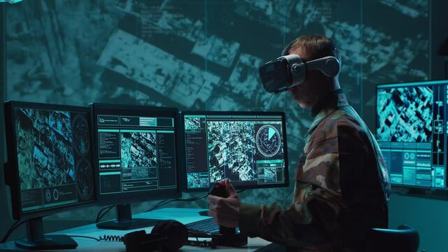 Military soldier operating advanced technology in a command center.