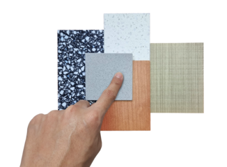 interior designers hand choosing materials contains ash and oak wooden veneer, artificial stone, marble terrazzo stone isolated on background with clipping path. combination of finishing material. 