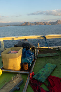 A tranquil view from a boat deck on a serene sea journey.