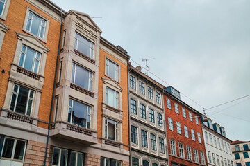 Architectural colorful facade of classic style urban building in Copenhagen, Denmark