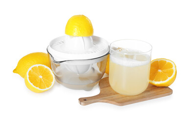 Fresh lemon juice in glass, juicer and fruits isolated on white