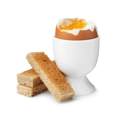 Soft boiled egg in eggcup with bread isolated on white