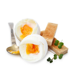 Fototapeta premium Soft boiled eggs, bread and spoon isolated on white