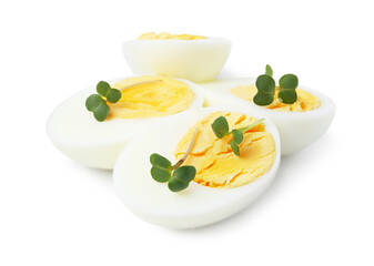 Halves of hard boiled eggs isolated on white