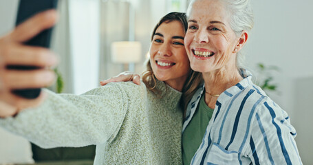 Woman, senior mom and selfie in home for memory, hug and care with bonding for post on mobile app....