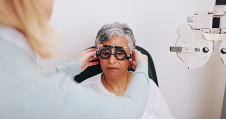 Doctor, optometry and woman with trial lens for eye care, consultation or hands in clinic for...