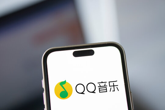 Dhaka, Bangladesh- 11 Dec 2024: Tencent QQ logo is displayed on smartphone. Tencent QQ is a instant messaging software.
