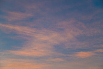 Serene Sunset Sky with Vibrant Orange and Soft Blue Hues